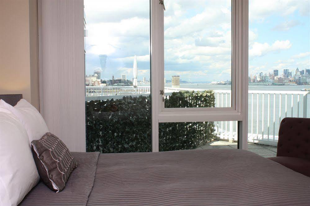 Dharma Home Suites Jc At Exchange Place ジャージーシティ エクステリア 写真
